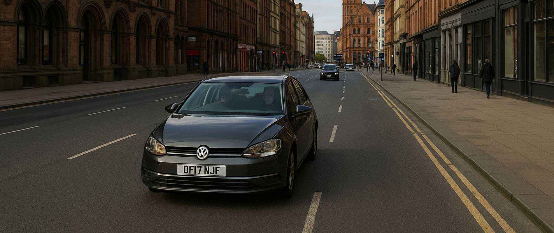Cars moving slowly in heavy traffic in manchester